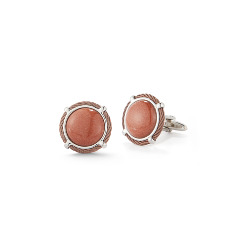 Pair of cufflinks featuring round, polished brown stones set in silver frames with a rope detail.