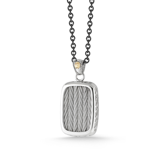 The braided cables, rectangular silver pendant with a yellow gem accent at the top.