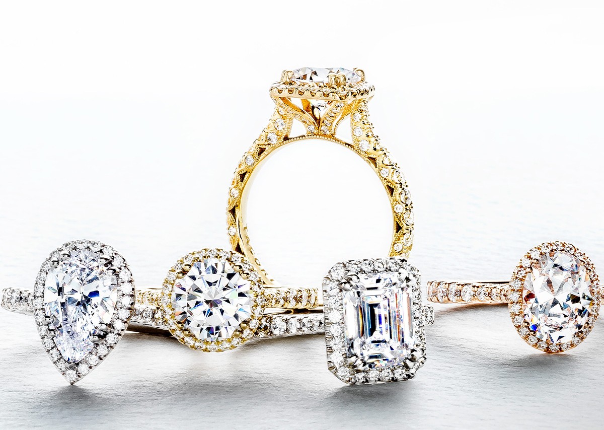 five TACORI engagement rings featuring diamonds, halos, and side stones